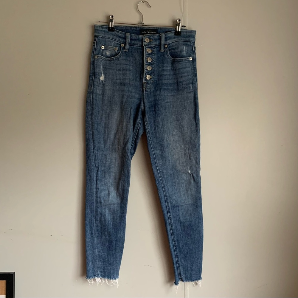 Lucky high waist button up raw hem jeans